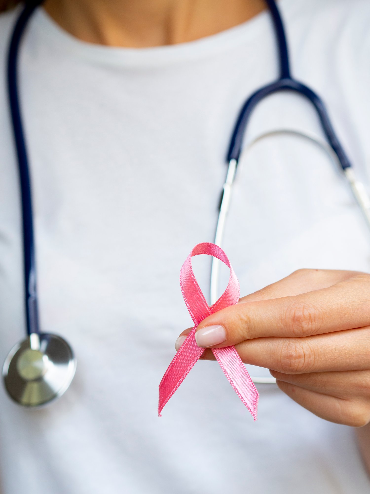 close-up-girl-with-pink-ribbon-stethoscope